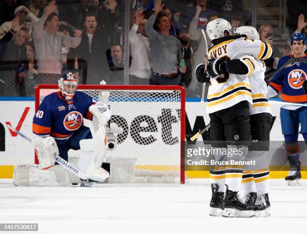 Charlie McAvoy of the Boston Bruins celebrates his second period goal against the New York Islanders at UBS Arena on January 18, 2023 in Elmont, New...