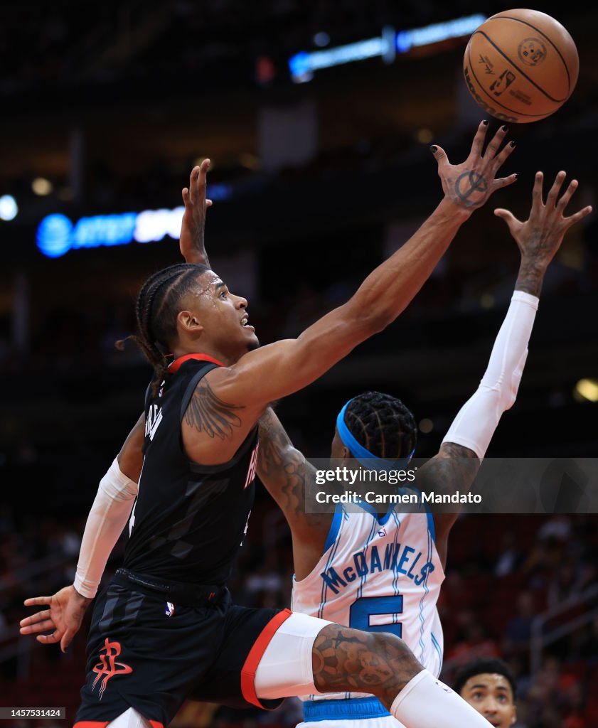 Hornets Rockets 2002 Jalen Green of the Houston Rockets shoots a basket over Jalen... News ...