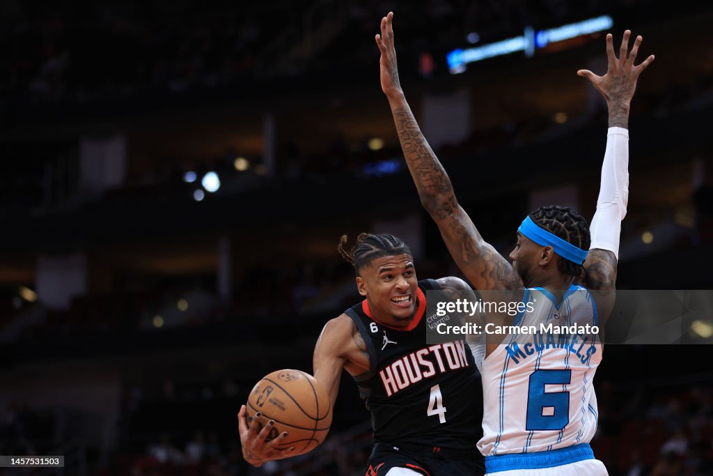 Hornets Rockets 2002 Jalen Green of the Houston Rockets shoots a basket over Jalen... News ...