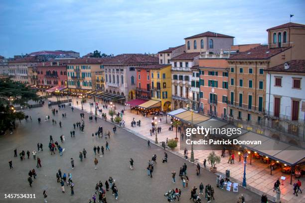 piazza bra, verona, italy - outdoor dining winter stock pictures, royalty-free photos & images