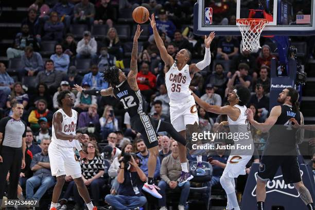 Ja Morant of the Memphis Grizzlies shoots against Isaac Okoro of the Cleveland Cavaliers during the first half of the game at FedExForum on January...