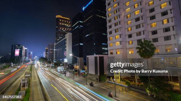 sudirman street jakarta indonesia. - sudirman stock pictures, royalty-free photos & images