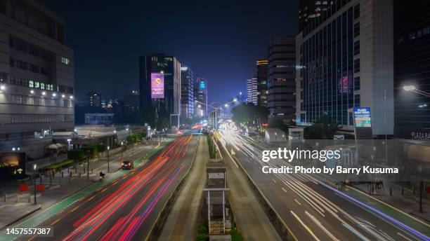 sudirman street jakarta indonesia. - sudirman stock pictures, royalty-free photos & images