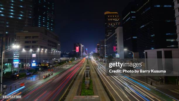 sudirman street jakarta indonesia. - sudirman stock pictures, royalty-free photos & images