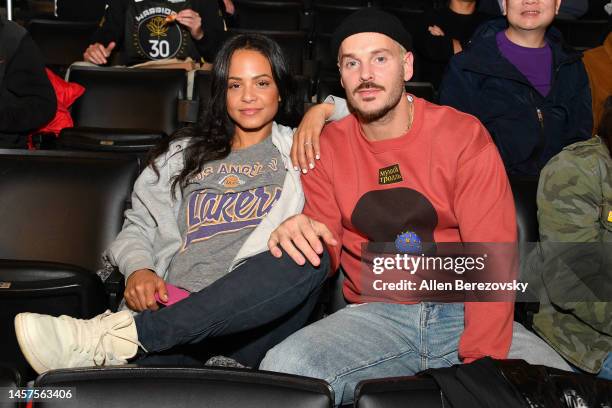 Christina Milian and M. Pokora attend a basketball game between the Los Angeles Lakers and the Sacramento Kings at Crypto.com Arena on January 18,...