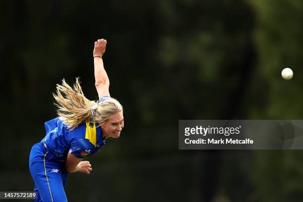 Holly Ferling of the Meteors bowls during the WNCL match between ACT and Tasmania at EPC Solar Park on January 19 in Canberra, Australia.