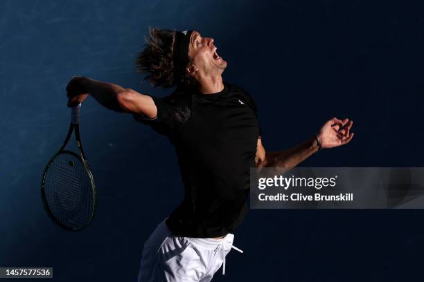 Alexander Zverev of Germany serves in their round two singles match against Michael Mmoh of the United States during day four of the 2023 Australian...