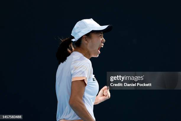 Shuai Zhang of China reacts in their round two singles match against Petra Martic of Croatia during day four of the 2023 Australian Open at Melbourne...