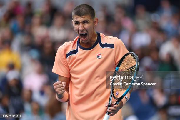 Alexei Popyrin of Australia reacts in their round two singles match against Taylor Fritz of the United States during day four of the 2023 Australian...