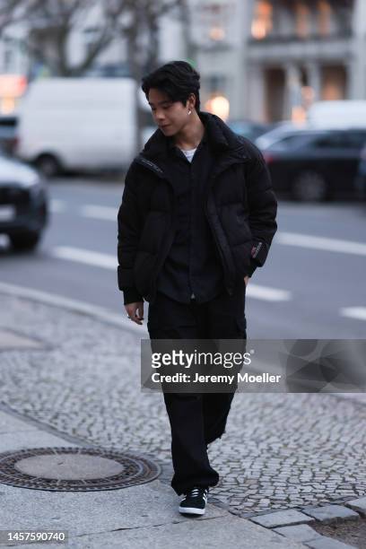 Noah Kächelin seen wearing black Adidas gazelle sneaker, black winter jacket, black shirt and a black wide trousers, before the William Fan show...