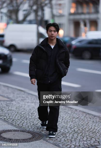 Noah Kächelin seen wearing black Adidas gazelle sneaker, black winter jacket, black shirt and a black wide trousers, before the William Fan show...