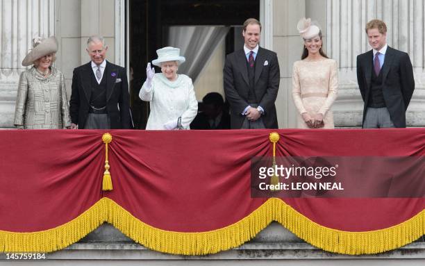 Britain's Queen Elizabeth II waves from the balcony of Buckingham Palace next to Camilla, Duchess of Cornwall, Prince Charles, Prince of Wales,...