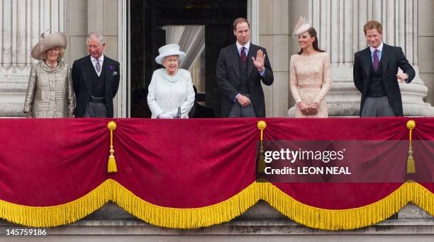 Prince William waves from the balcony of Buckingham Palace next to Camilla, Duchess of Cornwall, Prince Charles, Prince of Wales, Britain's Queen...