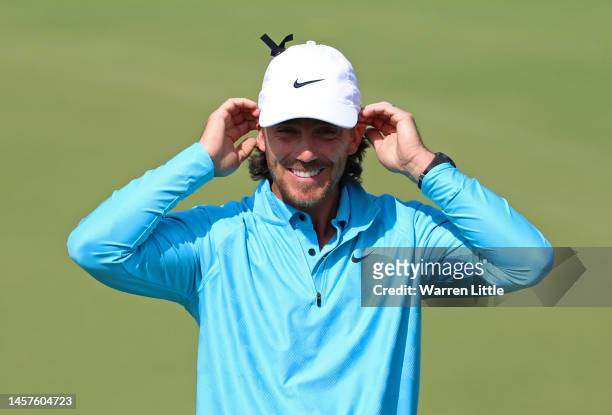 Tommy Fleetwood of England smiles on the ninth green during day one of the Abu Dhabi HSBC Championship at Yas Links Golf Course on January 19, 2023...
