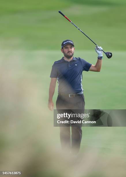 Angel Hidalgo of Spain plays his second shot on the second hole during the first round on day one of the Abu Dhabi HSBC Championship at Yas Links...