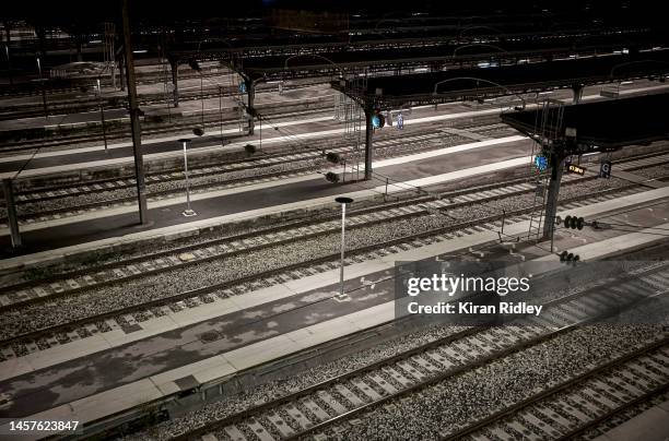 Train tracks lie empty at Gare de l'Est Railway Station in Paris as France is hit by widespread traffic disruption as transport workers join a...