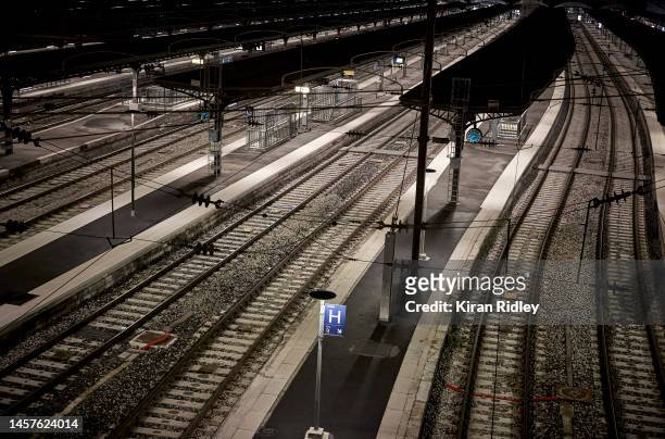 Train tracks lie empty at Gare de l'Est Railway Station in Paris as France is hit by widespread traffic disruption as transport workers join a...