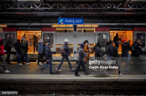 Passengers arrive at Gare de l'Est Railway Station in Paris as France is hit by widespread traffic disruption with limited services running as...