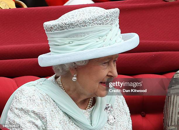 Queen Elizabeth II is seen during the Diamond Jubilee carriage procession after the service of thanksgiving at St.Paul’s Cathedral on the Mall on...