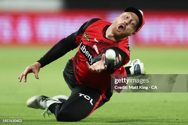 Martin Guptill of the Renegades attempts a catch during the Men's Big Bash League match between the Sydney Thunder and the Melbourne Renegades at...