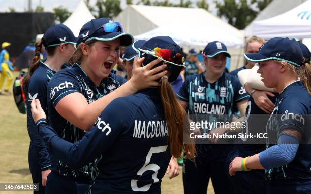 Grace Scrivens and Ryana MacDonald-Gay of England celebrate following the ICC Women's U19 T20 World Cup 2023 match between England and Rwanda at...