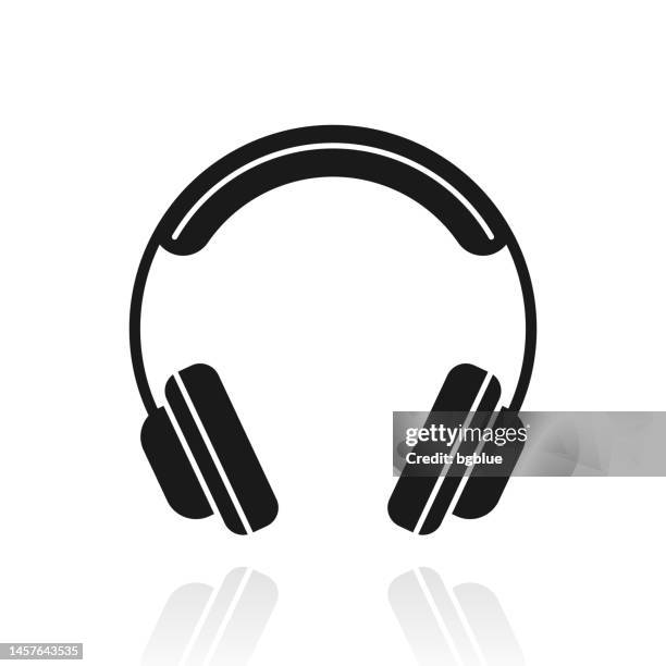 headphones. icon with reflection on white background - headphones white background stock illustrations