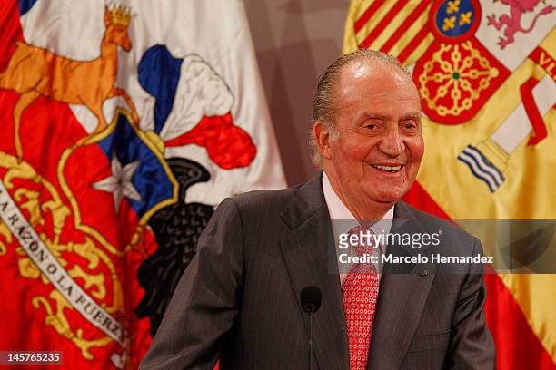 Juan Carlos king of Spain smiles during the visit to the Presidential Palace on June 5, 2012 in Santiago, Chile.
