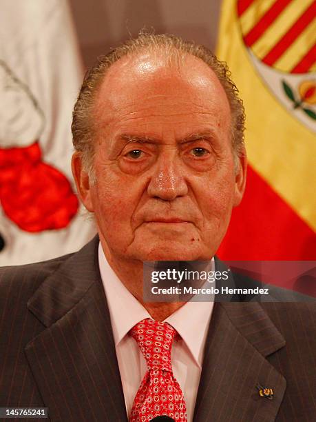 Juan Carlos king of Spain looks to the front during the visit to the Presidential Palace on June 5, 2012 in Santiago, Chile.