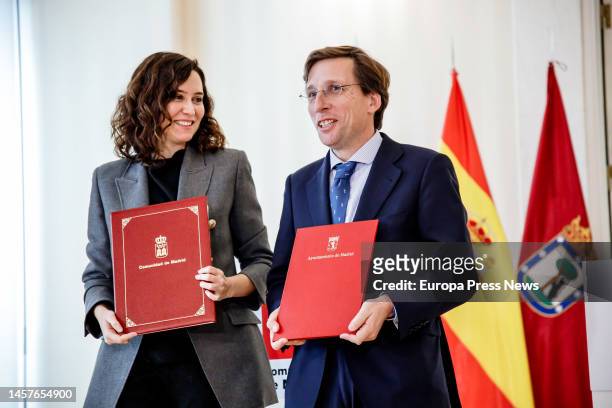 The President of the Community of Madrid, Isabel Diaz Ayuso, and the Mayor of Madrid, Jose Luis Martinez-Almeida, after signing an agreement on the...
