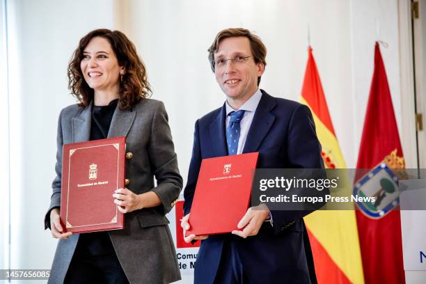 The President of the Community of Madrid, Isabel Diaz Ayuso, and the Mayor of Madrid, Jose Luis Martinez-Almeida, after signing an agreement on the...