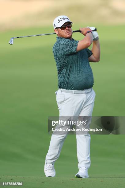 George Coetzee of South Africa plays his second shot on the seventh hole during day one of the Abu Dhabi HSBC Championship at Yas Links Golf Course...