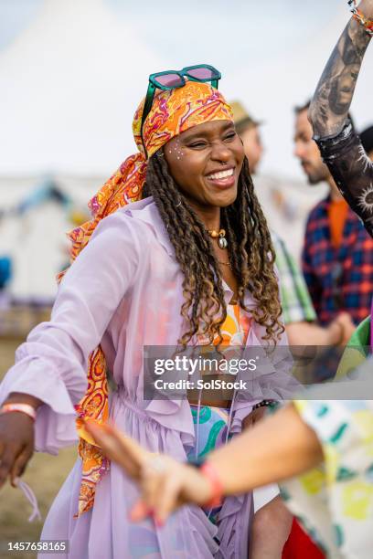 friends at a music festival - festival goer stock pictures, royalty-free photos & images