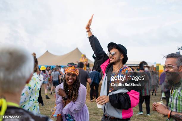 put your hands up! - music festival dancing stock pictures, royalty-free photos & images