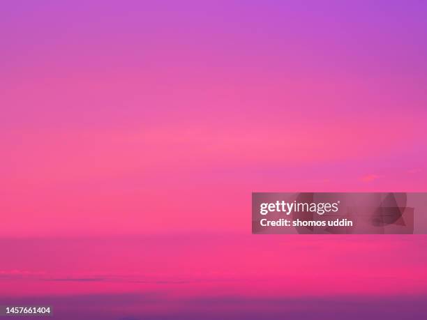 pink and purple colour sky at sunrise - purple sky stock pictures, royalty-free photos & images