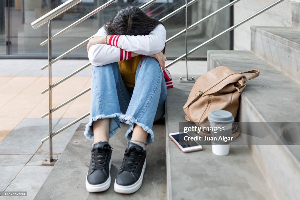 Anxious teenage student worried about school bullying