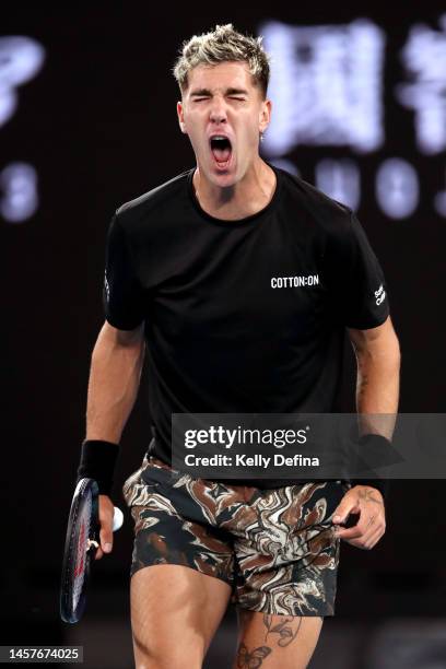 Thanasi Kokkinakis of Australia reacts in their round two singles match against Andy Murray of Great Britain during day four of the 2023 Australian...