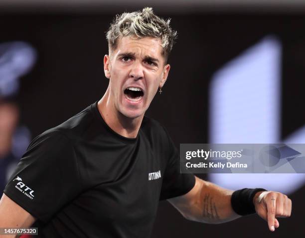 Thanasi Kokkinakis of Australia reacts in their round two singles match against Andy Murray of Great Britain during day four of the 2023 Australian...