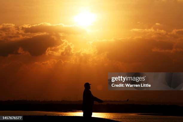 Thomas Bjorn of Denmark plays his second shot on the eighteenth hole during day one of the Abu Dhabi HSBC Championship at Yas Links Golf Course on...