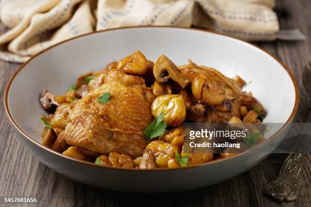 chicken and chestnut stew - chicken stew stock pictures, royalty-free photos & images