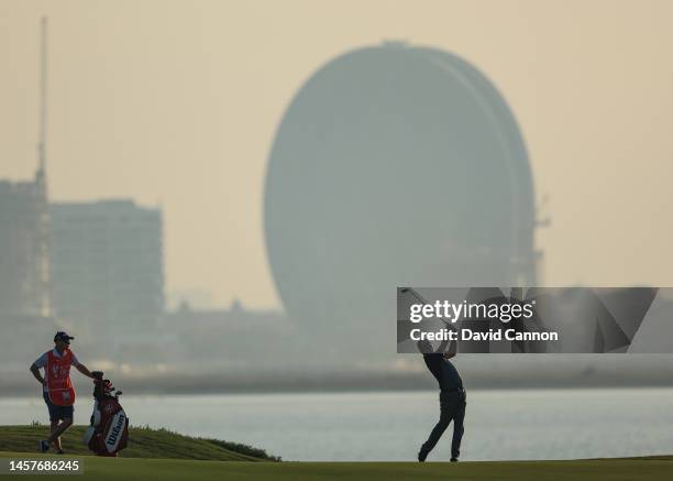 Padraig Harrington of Ireland plays his second shot on the 18th hole during the first round on day one of the Abu Dhabi HSBC Championship at Yas...