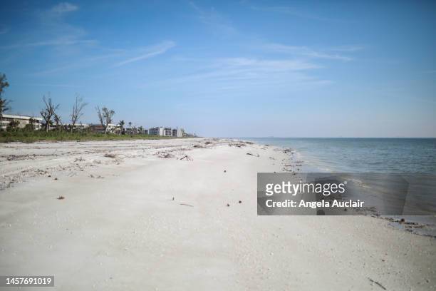 sanibel beach after hurricane - angela auclair stock pictures, royalty-free photos & images