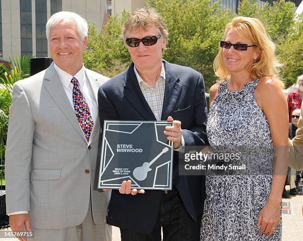 Bob Fisher, Steve Winwood and Eugenia Winwood attend the Music City Walk of Fame Induction of Steve Winwood and Bob Babbitt at Walk of Fame Park on...