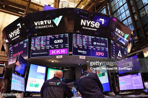 Traders work on the floor of the New York Stock Exchange during morning trading on January 19, 2023 in New York City. The stock market opened lower...