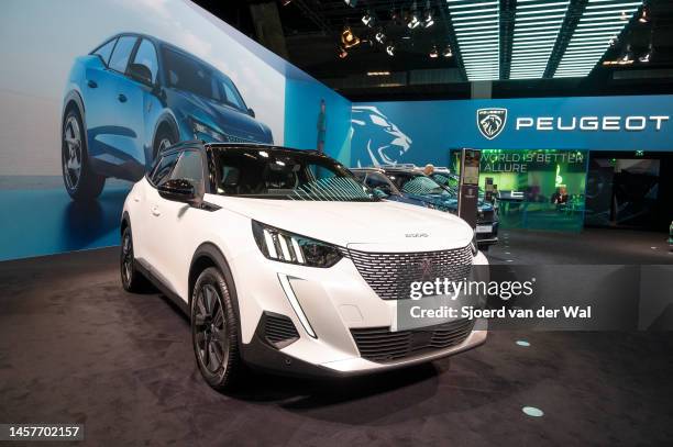 Peugeot e-2008 electric compact crossover SUV car at Brussels Expo on January 13, 2023 in Brussels, Belgium.