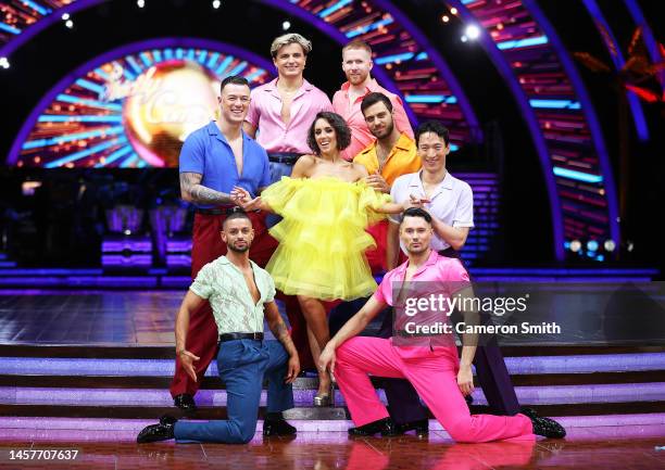 Janette Manrara poses on stage with contestants during the 'Strictly Come Dancing: The Live Tour 2023' photocall at Utilita Arena Birmingham on...