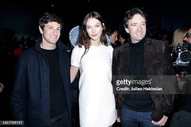 Joshua Kushner, Karlie Kloss and Antoine Arnault attend the Louis Vuitton Menswear Fall-Winter 2023-2024 show as part of Paris Fashion Week on...