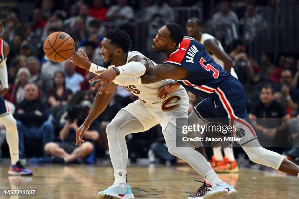 Will Barton of the Washington Wizards makes a steal from Donovan Mitchell of the Cleveland Cavaliers during the fourth quarter at Rocket Mortgage...