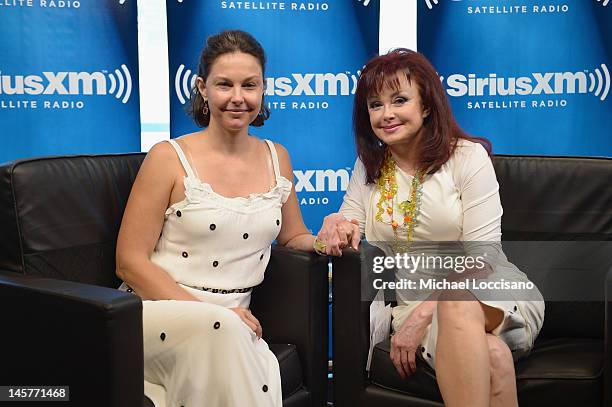 Actress Ashley Judd and mother, singer Naomi Judd pose following the launch of Naomi's SiriusXM series "Think Twice" at SiriusXM Music City Theater...