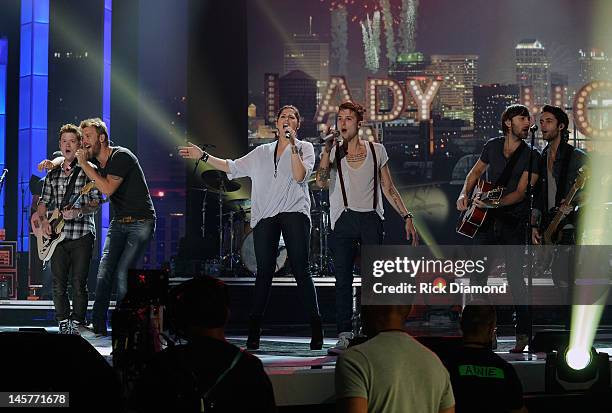 Lady Antebellum members Charles Kelley , Hillary Scott , and Dave Haywood are joined by Hot Chelle Rae members Nash Overstreet , Ryan Follese , and...