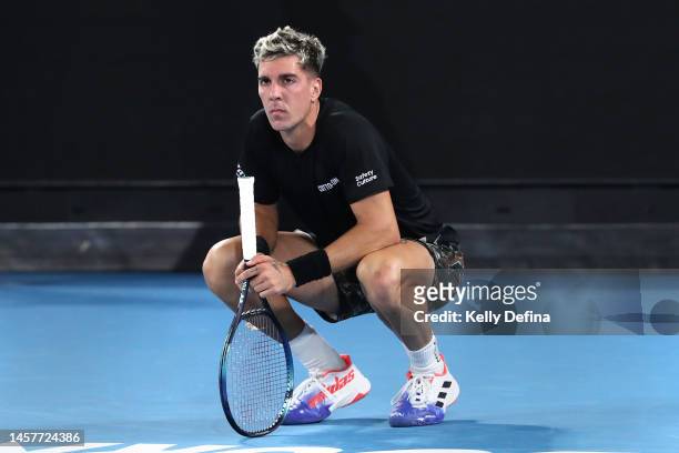 Thanasi Kokkinakis of Australia looks on in the prior to the final point of the match in their round two singles match against Andy Murray of Great...